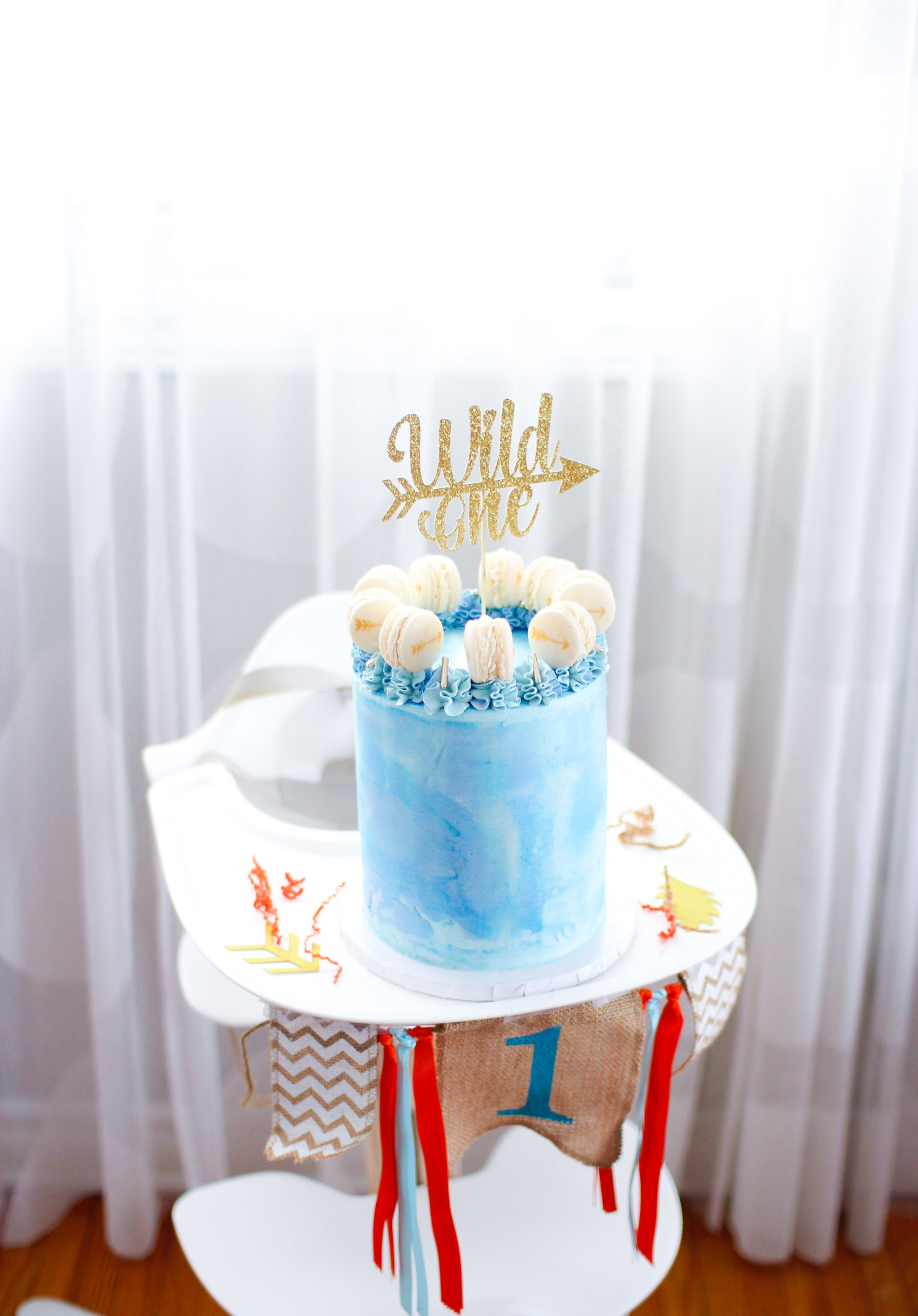 wild one blue first birthday cake