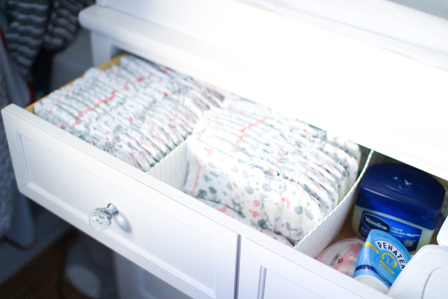 how to organize diapers in nursery