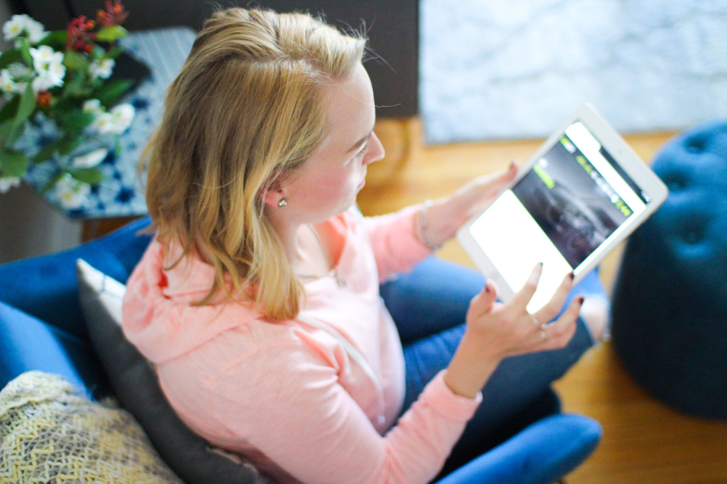 woman scrolling website on iPad