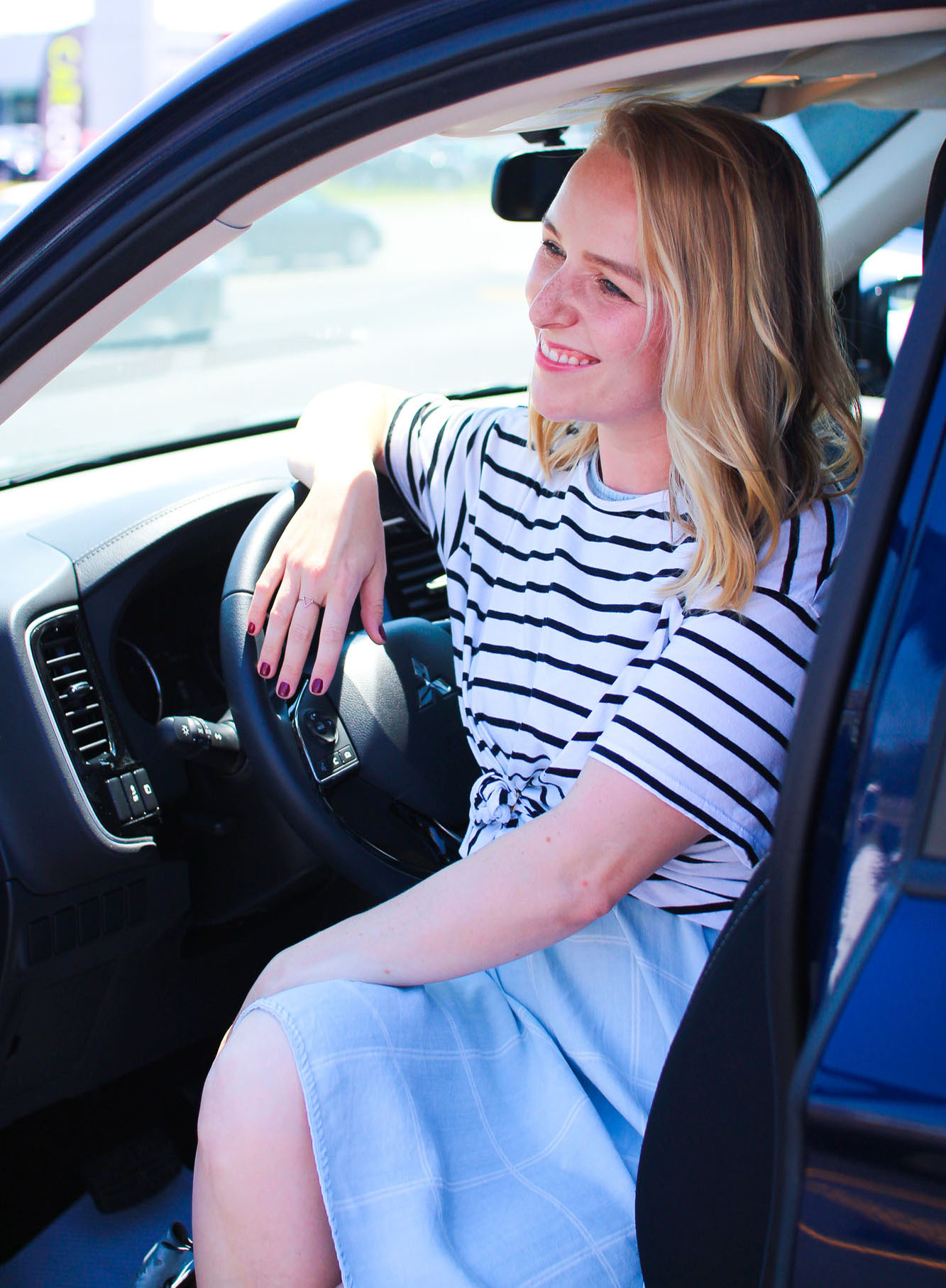 woman sitting in car