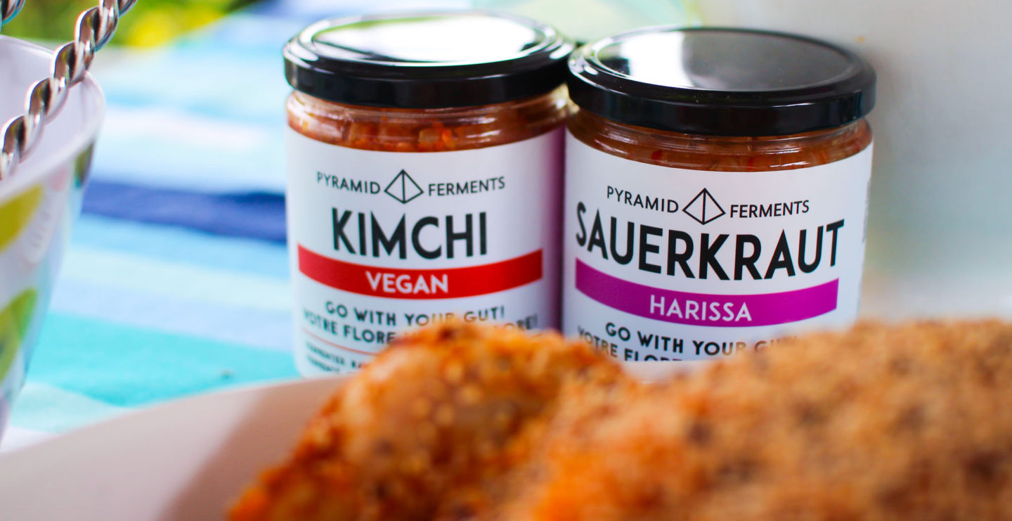 jars of pyramid ferments products with kimchi roast chicken
