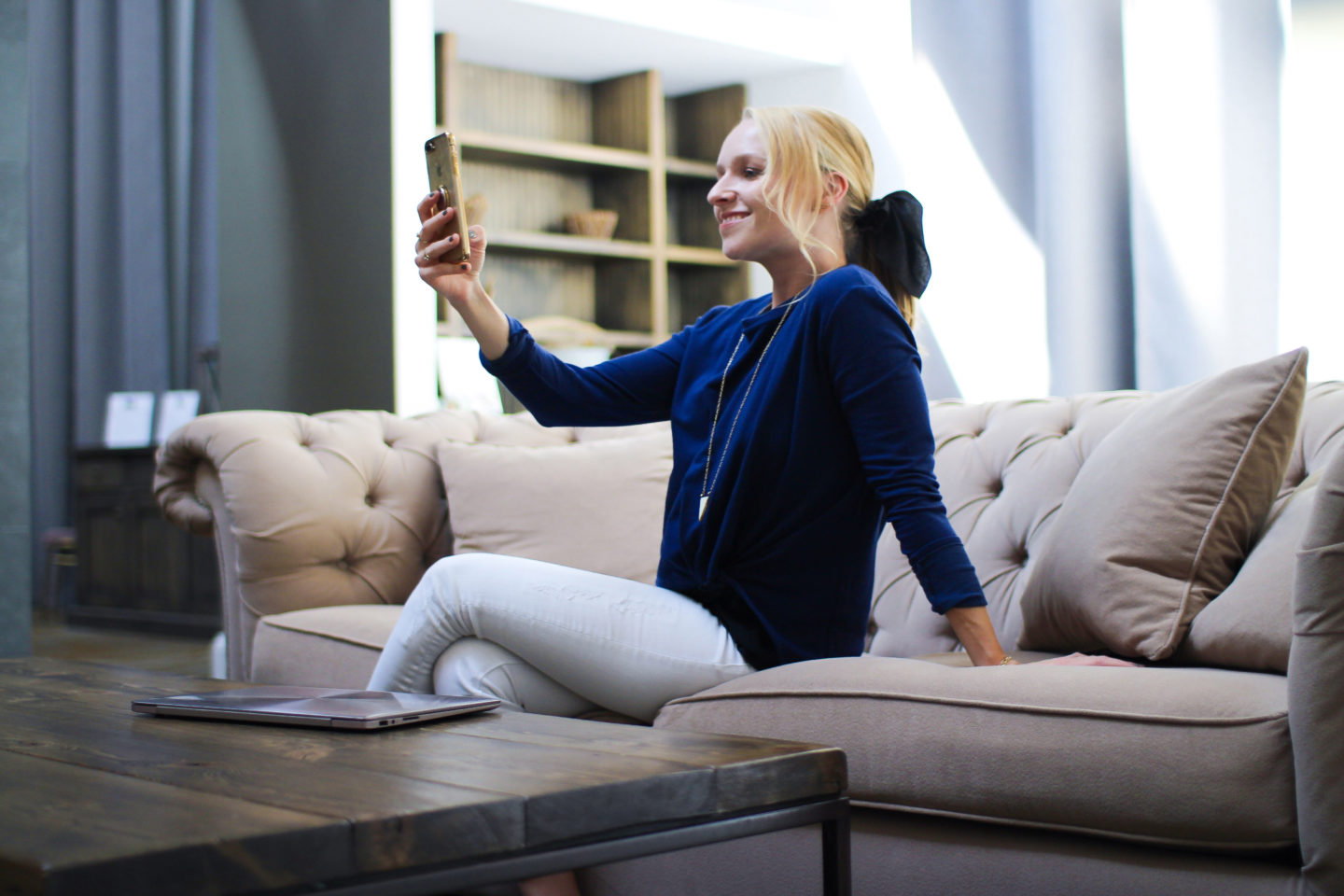 woman filming video on phone